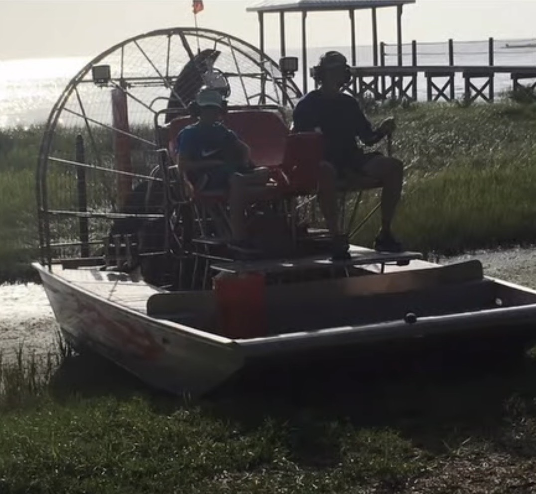 Airboat on the marsh at first light